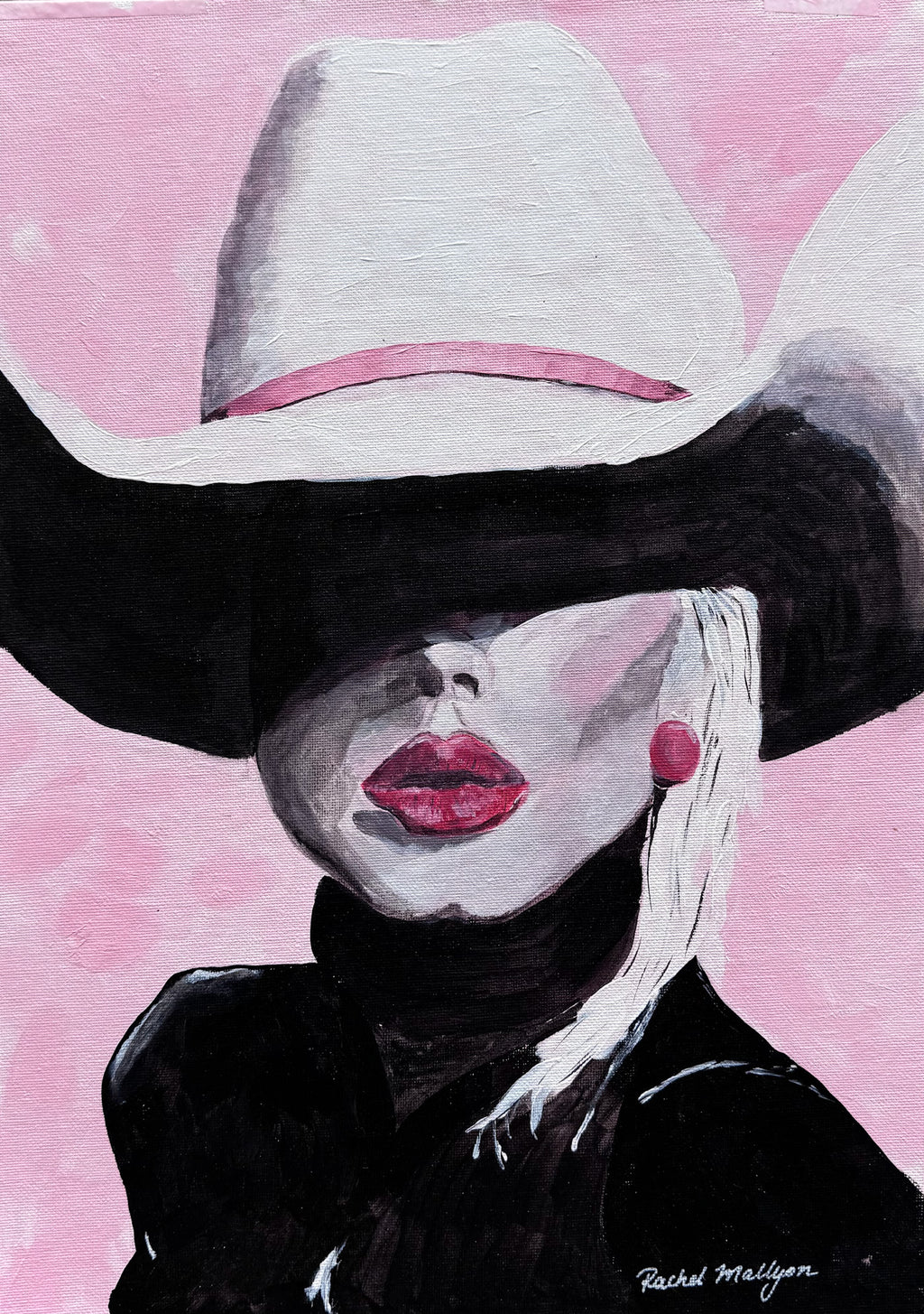 Western portrait with a sweeping white cowboy hat, black clothing and blush pink background.